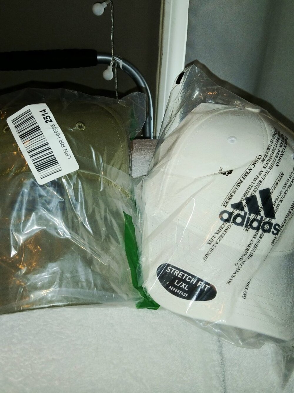 Pair of Adidas Hats in Plastic Stretch Fit L/XL